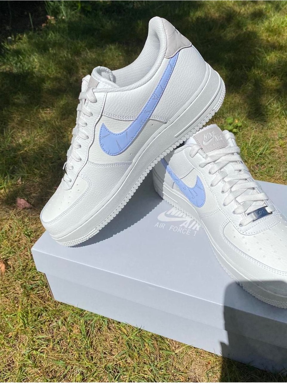 Nike Air Force ones White Low-Top Sneakers with Light Blue Swoosh